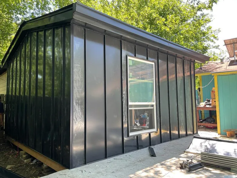 Black standing seam metal wall panels for Roof Inspection in Attalla